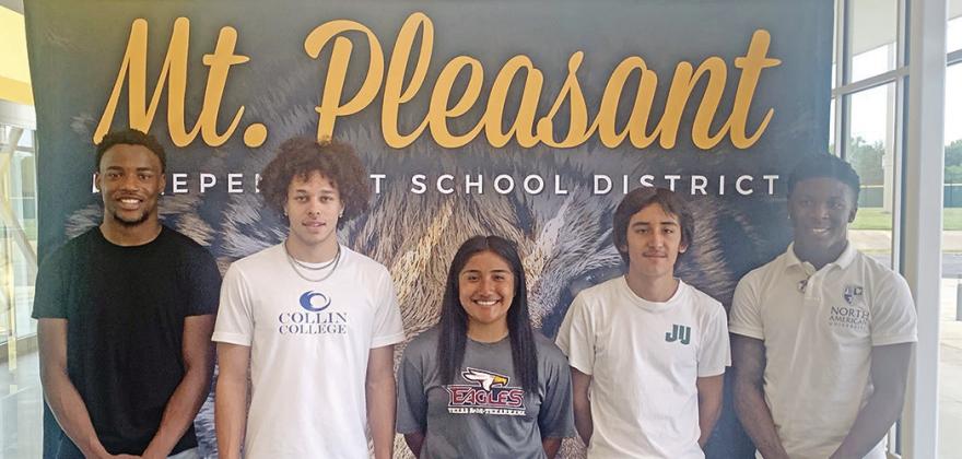 Five Mount Pleasant athletes signed letters of intent to continue playing their respective sports in college during a ceremony Wednesday afternoon. From left are Xavier Hills (track, Umpqua Community College), Payton Chism (basketball, Collin College), Dana Memije (soccer, Texas A&amp;M-Texarkana), Geovanni Calderon (track and cross country, Jacksonville University) and Kelcey Morris (football and basketball, North American University). TRIBUNE PHOTO / QUINTEN BOYD
