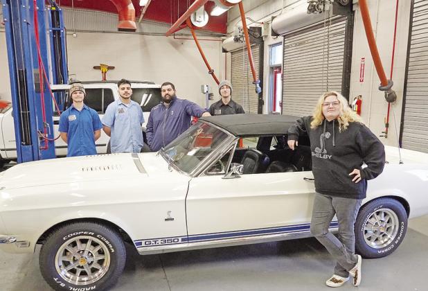 Shelby students who attended SEMA are pictured with the GT350 that was on display at the Shelby Heritage Center. From left is: Sam Nichols, Javier Macias, Josh Sigal, Kolby Perkins, Rebekah Briggs. COURTESY PHOTO