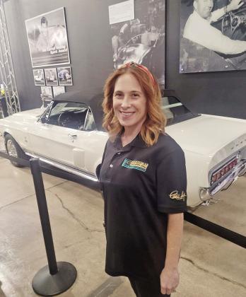 Former Shelby student Beth VanDyke pictured in Vegas with the car she helped restore during her internship with Legendary COURTESY PHOTO