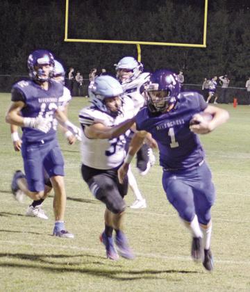 Connor Young speeds away from the Como-Pickton defense on his way to his second touchdown of the night. The Rebels defeated the Eagles, 27-6, and will look to extend their winning streak Friday at district favorite Cooper. TRIBUNE PHOTO / QUINTEN BOYD