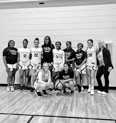 Lady Tigers roll to 8-0 start, Crandall Tournament title