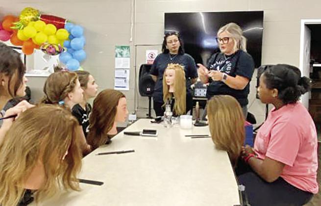 Cosmetology students volunteer at Ignite Youth Club