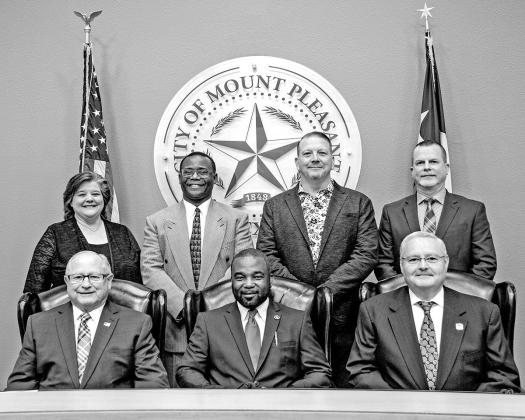 Above: (Back row L-R) Councilmembers Sherri Spruill, Jerry Walker, Galen Adams and Henry Chappell, II. (Front Row L-R) City Manager Ed Thatcher, City Mayor Tracy Craig, Sr. and Mayor Pro Tem Tim Dale. COURTESY PHOTO