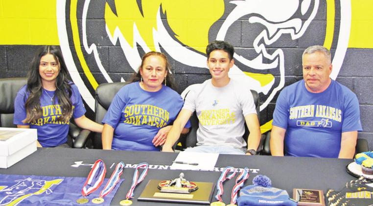Mount Pleasant distance and cross-country runner Daniel Robles recently signed his letter of intent to run at Southern Arkansas University. Robles has been a district champion in the 1,600 meters, 3,200 meters and in cross-country. COURTESY PHOTO / MPISD
