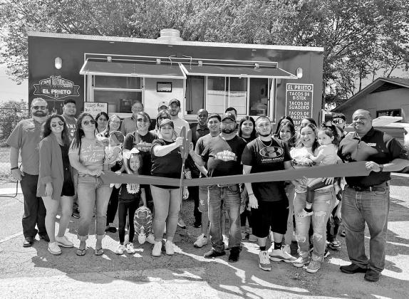 The Mount Pleasant Chamber of Commerce held a ribbon cutting to welcome Tacos El Prieto food truck. The food truck is located at 908 W. 1st St. in Mount Pleasant. COURTESY PHOTO