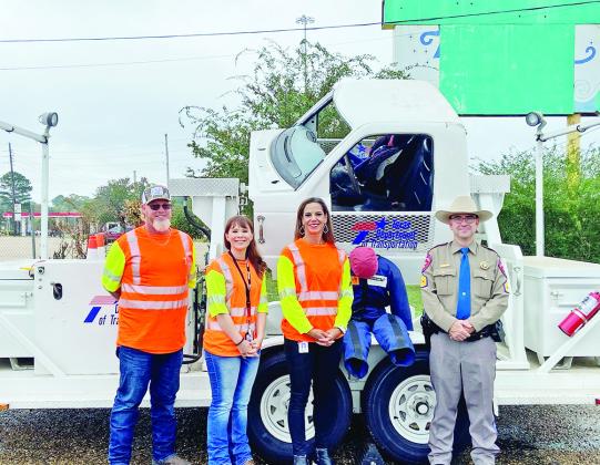 From left to right, TxDOT Equipment Mechanic Rusty Anderson, Public Information Officer Heather Deaton, District Engineer Rebecca Walls and Sargeant Gregg Williams with the DPS TRIBUNE PHOTO / RYLEIGH STEGALL