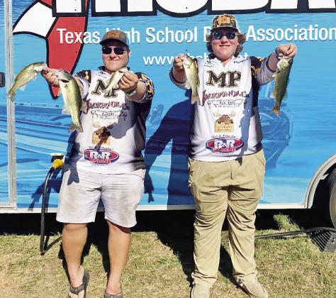 Clayton Miller (left) and Rolston Morton (right) show off their catches for the day.