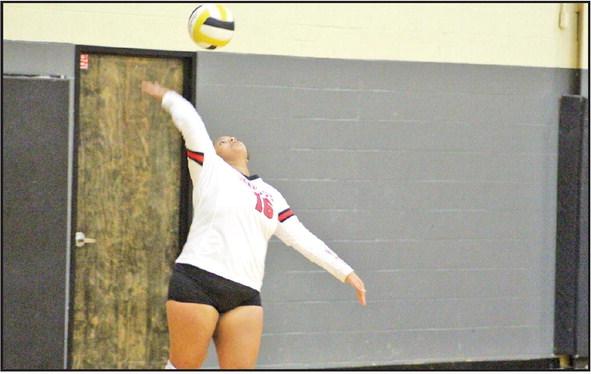 Chapel Hill’s Soraya Solis prepares to serve during a recent match. Solis and the Lady Devil volleyball team won their district opener Friday over Quitman, stretching the team’s winning streak to five. The Lady Devils traveled to Harmony Tuesday and will host Mount Vernon Tuesday. TRIBUNE PHOTO / QUINTEN BOYD