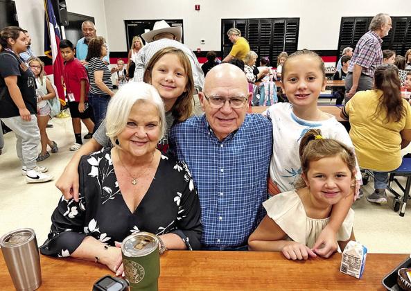Grandparents Sandy and Larry Bible are pictured with their granddaughters Ava Claire Hageman, Holland Hageman and Chandler Bell.