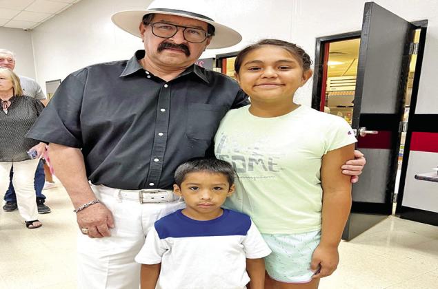 Grandfather Jorge Santiesteban is pictured with granddaughter Angelie Banda and grandson Joziah Santiesteban. COURTESY PHOTOS