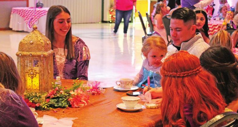 Rapunzel also visited the children at the ball.
