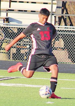Chapel Hill’s Lucas Banda makes a pass during the Red Devils’ game against Texas High.The Red Devils went 1-2 for the tournament. COURTESY PHOTO