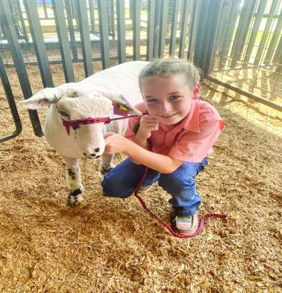 Janelle Snodgrass, fifth grade, will be showing a market goat and breeding ewe.