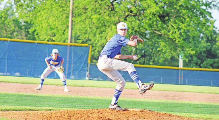 Harts Bluff’s Cohen Williams prepares a pitch during Friday’s game at Sulphur Bluff. The Bulldogs will officially play in their first UIL district next year. TRIBUNE PHOTO / QUINTEN BOYD