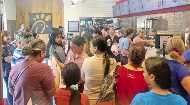 The community turned out hoping to get their first taste of the food at Mount Pleasant’s Chick-Fil-A location Thursday during the grand opening. TRIBUNE PHOTO / QUINTEN BOYD