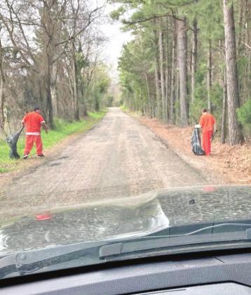 Inmates clean up county
