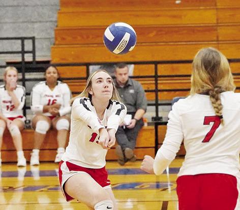 Chapel Hill’s Keira Hawkins bumps as teammates back her up. The Lady Devils defeated Ore City and Clarksville in their last two matches and opened district against Quitman Friday. COURTESY PHOTO