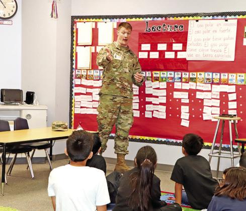 SFC Trevor Meek speaks to students about jobs available in the US Army