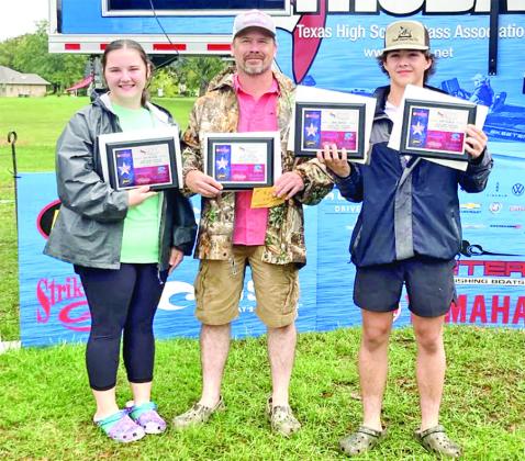 Khloe Dunn (left), Boat Captain James Dunn (center), and Kamen Dunn (right) with their Tournament Champion and Big Bass awards