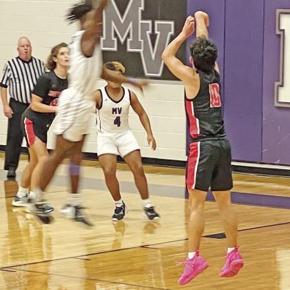 Adrian Ramirez fires a three-pointer. The eighth-ranked Red Devils defeated Mount Vernon, 50-29, and took on Winnsboro Tuesday. Both Chapel Hill squads will play at Mineola Friday. COURTESY PHOTOS