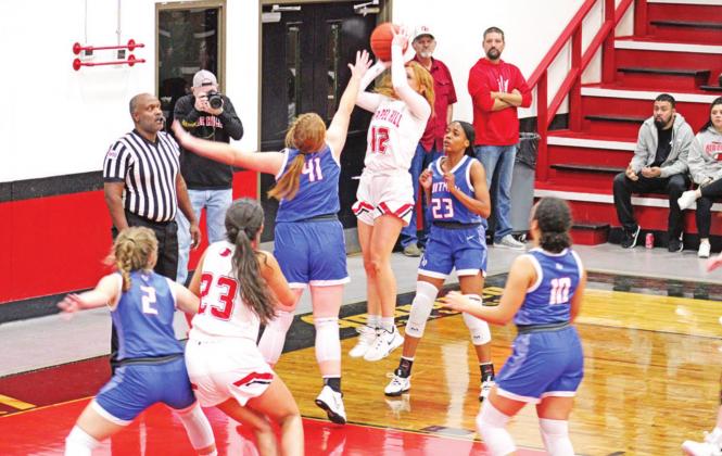Carolina Newman puts up a shot during Chapel Hill’s game against Quitman. Newman scored 11 points as the Lady Devils remained undefeated in district play. TRIBUNE PHOTO / QUINTEN BOYD