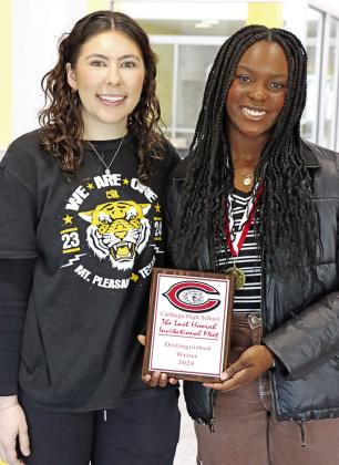 Ready Writing coach Gabrielle Robbins (left) and MPHS senior, Makayla Spigner, with her Distinguished Writer award