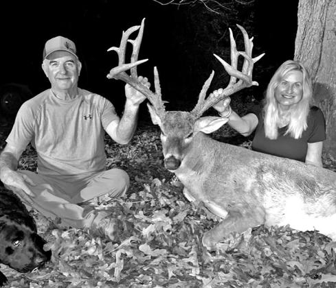 Shanda and Rodney Moore with the impressive Trinity County bruiser the lady hunter brought down on the afternoon of November 4. The 6 1/2-year-old 21 pointer registers official TBGA scores of 185 7/8 gross and 175 6/8 net. It’s among the biggest whitetails ever killed by a lady hunter in the Pineywoods. COURTESY PHOTO / RODNEY MOORE