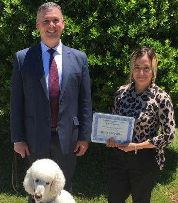 NTCC Professor John Russo with student Maria Valdelamar who was named Outstanding History Student this semester and Professor Russo’s ever-present and popular seeing-eye dog.