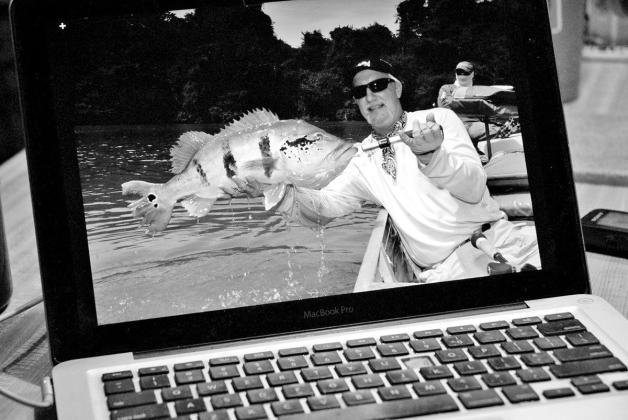 The author’s old MacBook Pro laptop has survived multiple trips to the wilds of the Amazon Rainforest and to some of Mexico’s finest bass lakes. With a swollen battery, busted keyboard and obsolete operating system, the PC is limping on its last leg and way past due for a replacement. (Photo by Matt Williams)