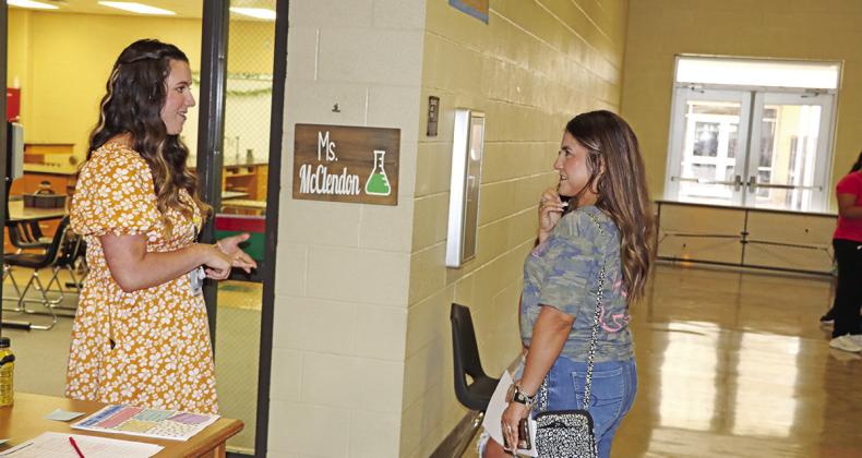 MPJH teacher, Peyton McClendon, answers questions from a parent. COURTESY PHOTOS
