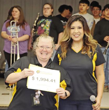 MPISD GT teacher receives a grant for robotics materials from Foundation member Esther Smith. COURTESY PHOTO