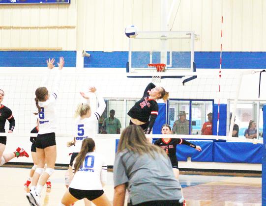 COURTESY PHOTOS / SUSAN LINDSEY - BOWIE COUNTY CITIZENS TRIBUNE The Chapel Hill volleyball team competed at the Hooks tournament last week; Chapel Hill earned a third place finish in the Gold Consolation bracket with a win over Jefferson.