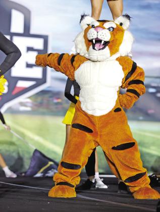 The Tiger mascot, Lakyn Fortenberry, pumps up the crowd