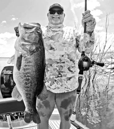 Leroy Boss with the 14.85 pounder he caught off a spawning bed recently while fishing at Lake O.H. Ivie with Hill Country Hammers Guides and Outfitters.