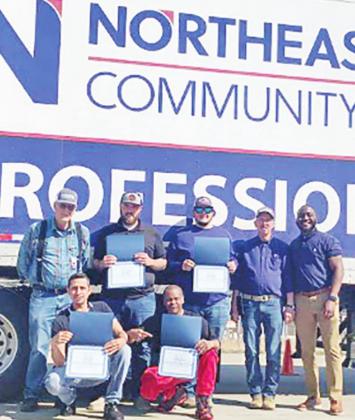 Pictured (top row from left) is: Bob Wentzell (Instructor), Steven McNutt (Graduate), Bradley Daniels (Graduate), Ed Kerley (Instructor), and Jimmy Smith (Workforce Developer). Pictured (bottom row from left) is: Jorge Castillo (Graduate), and William Lasley (Graduate). COURTESY PHOTO
