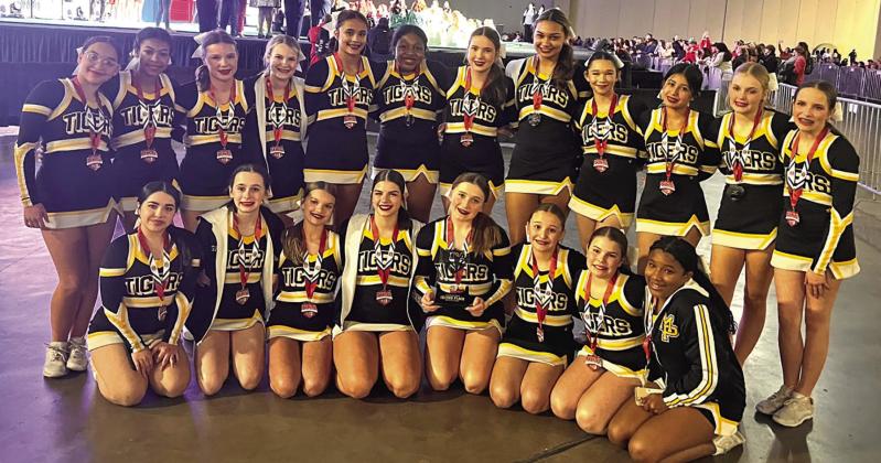The Mount Pleasant Junior High School Cheerleaders with their 2nd place medals. COURTESY PHOTO
