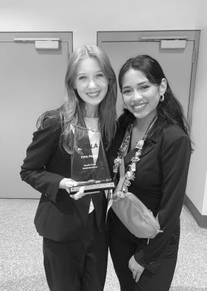 Natalie Crockett (left) with her national fifth place trophy and national finalist Mea Banda (right). COURTESY PHOTO