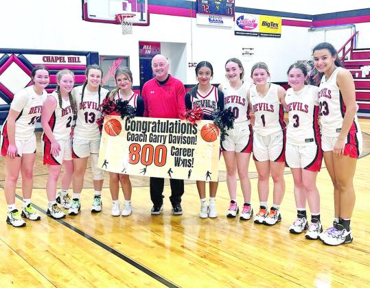 COURTESY PHOTOS The Chapel Hill Lady Devils celebrated milestones reached by two of their own Tuesday night following the team’s home win over Daingerfield. Senior Katie Hart scored her 1,000th point as a member of the Lady Devils. Also, Head Coach Garry Davison picked up his 800th career coaching win. Both Hart and Coach Davison looked to add to their totals over the weekend as the Lady Devils took part in the Winnsboro Hoopfest.