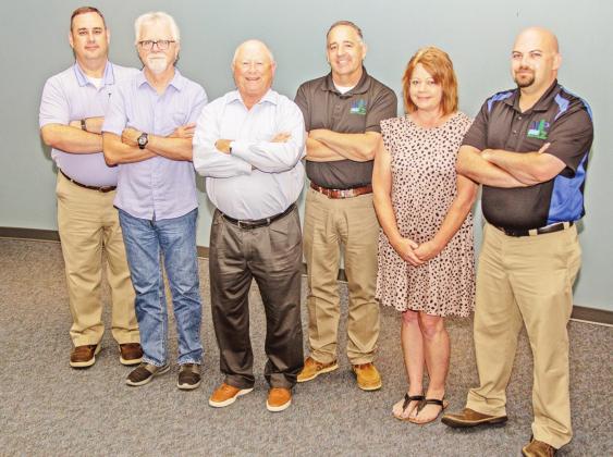 From left: B.J. Andrews, Code Compliance Supervisor; John Ankrum, Building Inspector; Ed Thatcher, City Manager; Robert LaCroix, Planning Director; Regina Smith, Administrative Assistant; and Colton House, Code Enforcement Officer 1. COURTESY PHOTO