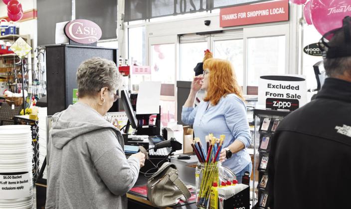 Locals gathered at Mason’s TrueValue Friday to celebrate the store’s grand opening. For more photos, see page 2. TRIBUNE PHOTOS/ LINCOLN OGLESBY