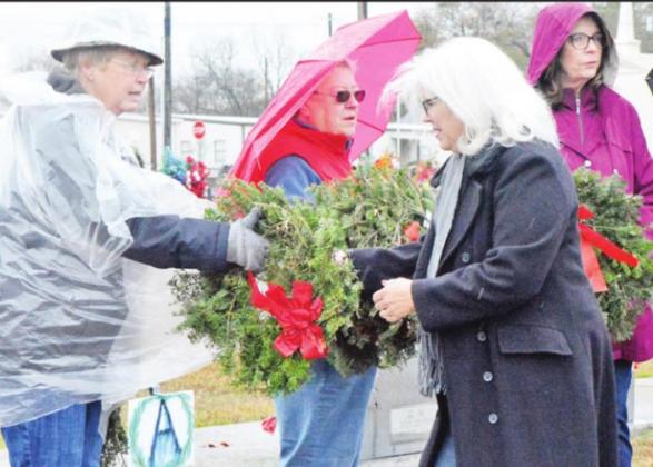 Volunteers lay wreaths on gravesites at last year’s Wreaths Across America event here in Titus County. Pictured are Netta Walker, Mavis Brush, Jammie Barker and Diane Patrick COURTESY PHOTO / HUDSON OLD, EAST TEXAS JOURNAL