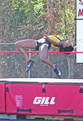 Tiyanna Canton clears the bar for 1st in JV high jump. PHOTOS BY ABBY PHELAN