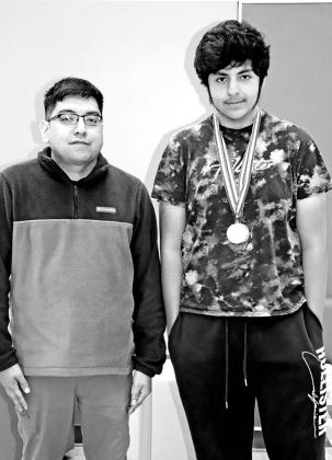 UIL State Calculator Applications coach Osias Hernandez (left) and Nathaniel Martinez (right)