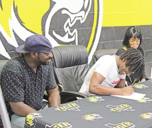 Mount Pleasant running back Edward Wilder recently signed his letter of intent to play football at Oklahoma Panhandle State University, located in Goodwell, Okla. TRIBUNE PHOTO / QUINTEN BOYD