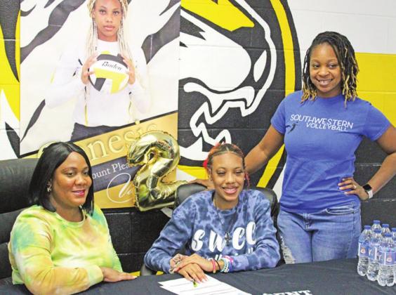 Mount Pleasant volleyball player Genesis Roberson signed her letter of intent Monday evening with Southwestern Christian College of Terrell. She is pictured with her mother (left) and SWCC coach LaReisha Murphy. TRIBUNE PHOTO / QUINTEN BOYD