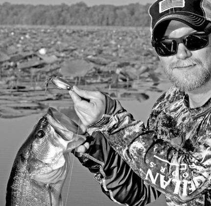 A hollow body walking frog is a great choice for tempting head-hunting bass hanging out beneath lily pads. Texas bass pro Keith Combs of Huntington says the best lily pads are those with “clean water” beneath them. COURTESY PHOTO / MATT WILLIAMS