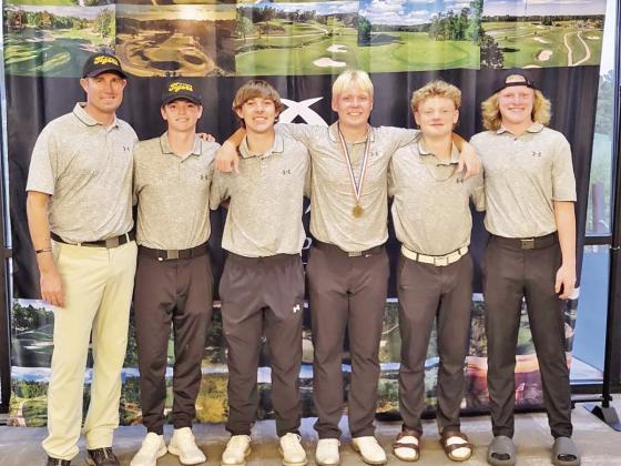 Tiger Golf (L to R) Coach Benny Blaser, Owen Green, Braiden Merryman, Jacob Baker, Brandon Carter, and Hogan Horn