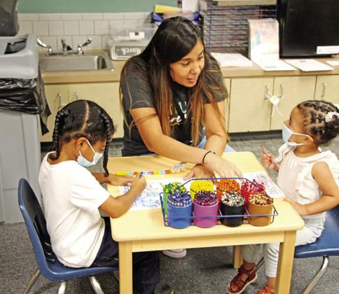 Child Development Center teacher, Stephanie Zuniga, gets to know some of her new students