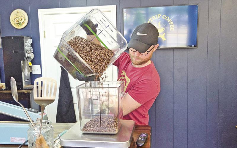 Managering Member Michael Atkins in the roasting process (Courtesy of Cantrip Coffee)