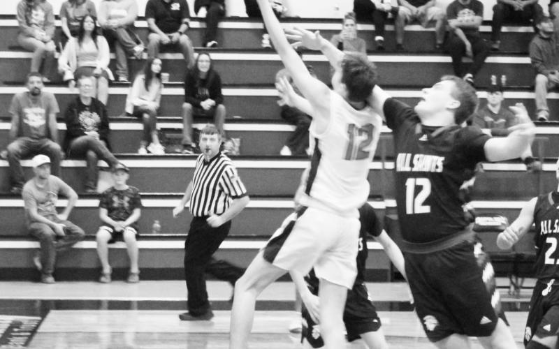 Red Devils defeat Trojans
